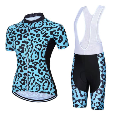 a women's cycling outfit with a blue and black leopard print